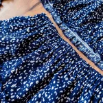 ست تاپ و دامن سرمه‌ای خال‌خال دخترانه - Image 2