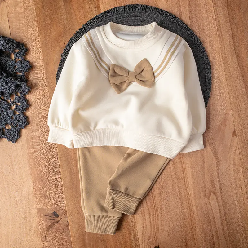 ست دو‌تکه دخترانه کرم رنگ با طرح پاپیون