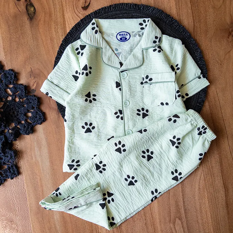 ست راحتی کودکانه جلو‌دکمه‌ای با طرح جاپای سگ