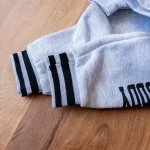 ست هودی شلوار مشکی با چاپ حرف H