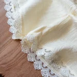 ست لباس بچه‌گانه زارا شامل کراپ و شلوارک کرم قهوه‌ای