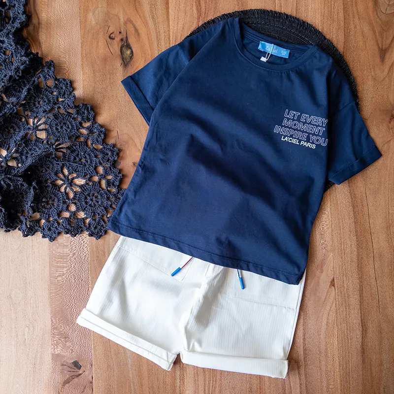 ست تیشرت و شلوارک سرمه‌ای سفید لاسیل