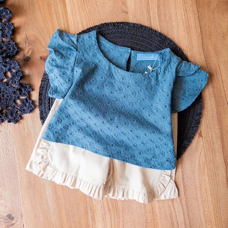 کراپ دامن بچه‌گانه لاسیل سرمه‌ای و کرم