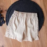 ست کراپ و دامن لاسیل طرح سرمه‌ای کرم - Image 3