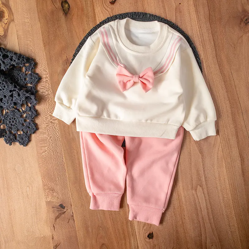 ست دو‌تکه دخترانه صورتی با طرح پاپیون