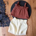 کراپ شلوارک بچه‌گانه زارا به رنگ کرم قهوه‌ای