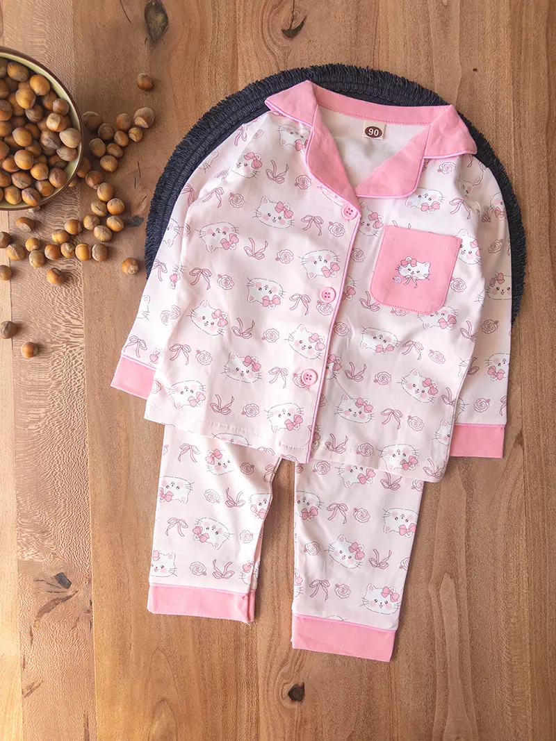 لباس راحتی بچگانه دخترانه صورتی جلو دکمه‌ای با طرح گربه و پاپیون