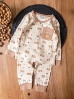 لباس راحتی دخترانه کرم با طراحی خرس کارتونی و قلب روی سینه