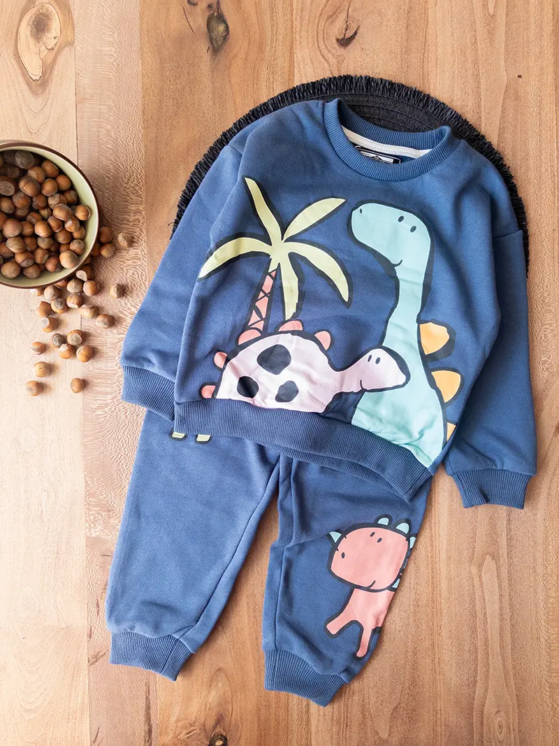 ست دورس‌ و شلوار دایناسور سرمه‌ای نکست بچه‌گانه