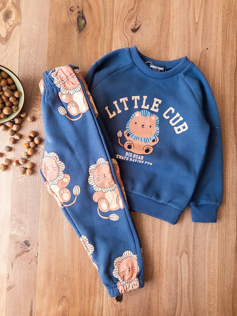 ست دورس‌ و شلوار شیر سرمه‌ای نکست بچه‌گانه نمای رو‌به‌رو با فیت راحت