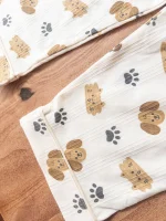 لباس بچگانه راحتی با طرح فانتزی سگ و گربه روی زمینه کرم