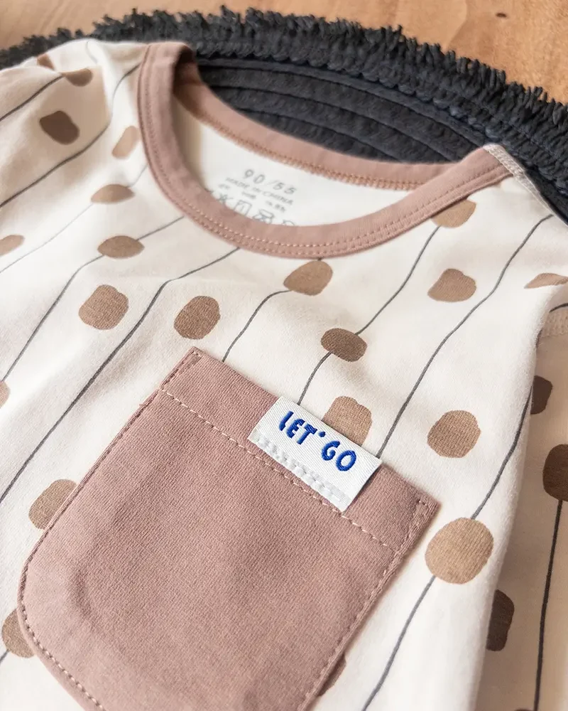 لباس بچگانه کرم با طرح دات کلاسیک و یقه گرد