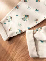 لباس کودک با یقه گرد و چاپ شخصیت کارتونی کروکودیل سبز