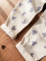 بلوز و شلوار دخترانه نخی با طراحی تدی خرسی و خطوط راه‌راه