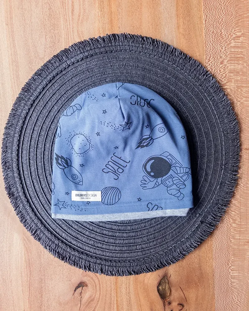 کلاه بچه‌گانه طرح فضانورد آبی با لبه طوسی