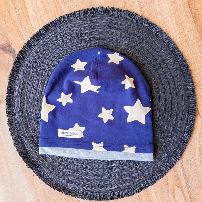 کلاه نخی یا تدی زمستانی با طرح ستاره و رنگ سرمه‌ای